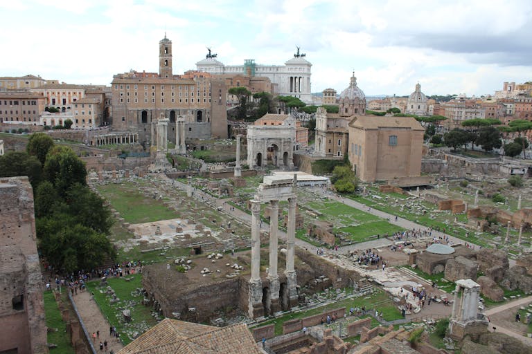 SocialMediaGirls Forum Explore the iconic ruins of the Roman Forum in Rome from a stunning aerial perspective.