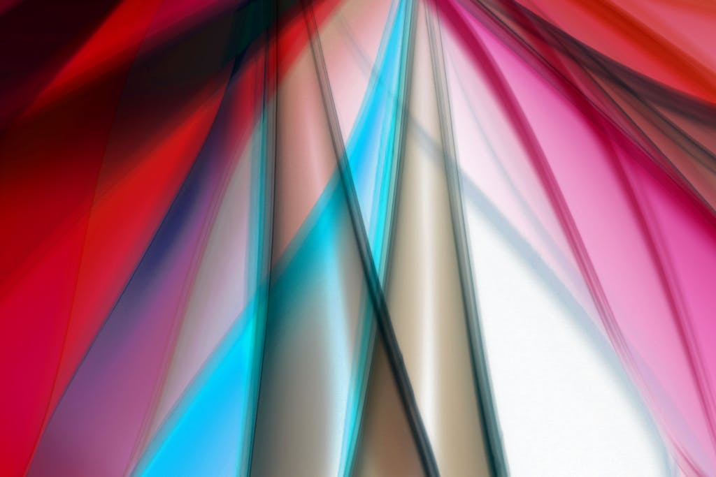 Bolly4u Me Vibrant abstract art with flowing colors and dynamic shapes, creating a sense of movement and energy.