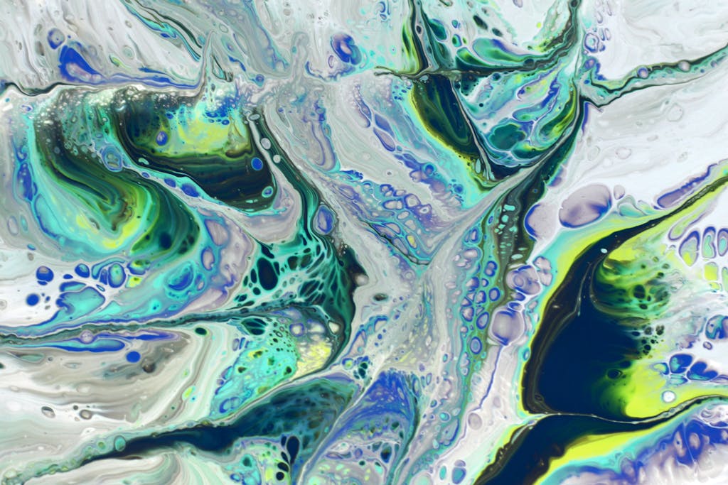 Bin Matcha Vibrant abstract fluid art featuring swirling colors of blue, green, and yellow.